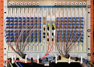 An optical line terminal, with many neat wires leaving it